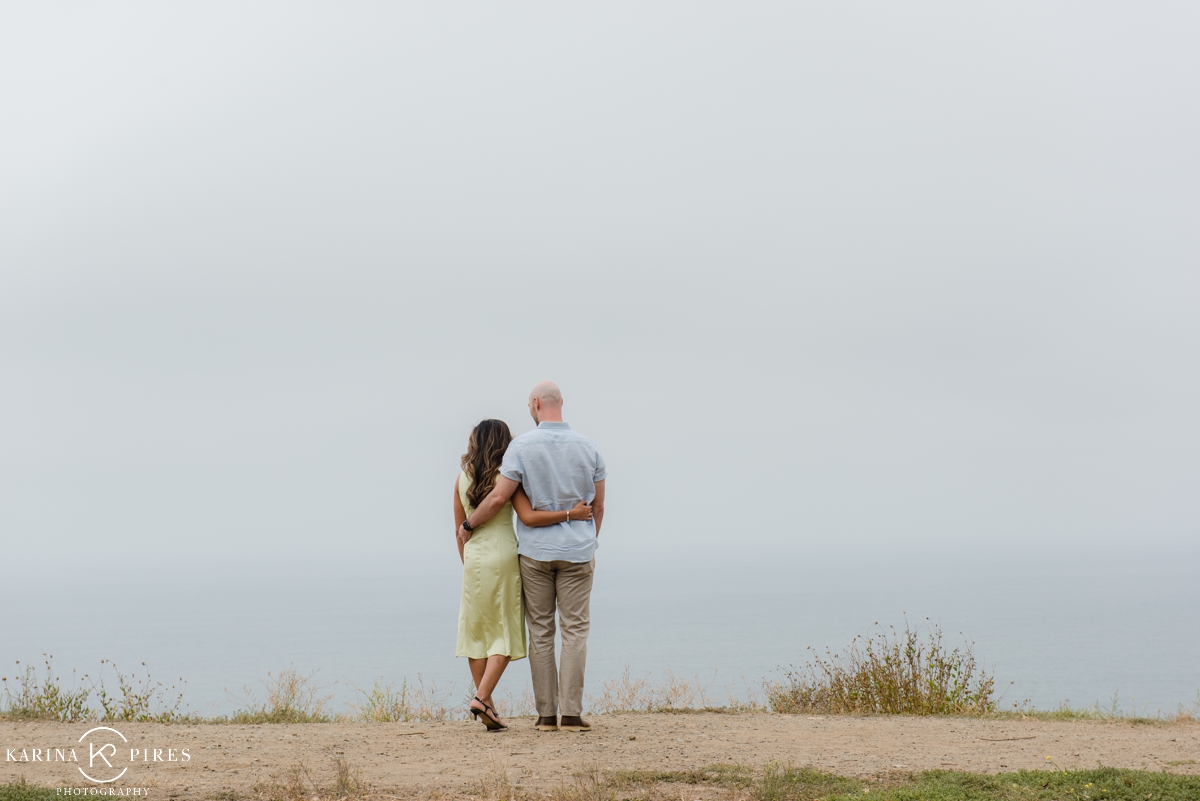 Couple overlooking the Pacific Ocean in LA before their surprise proposal