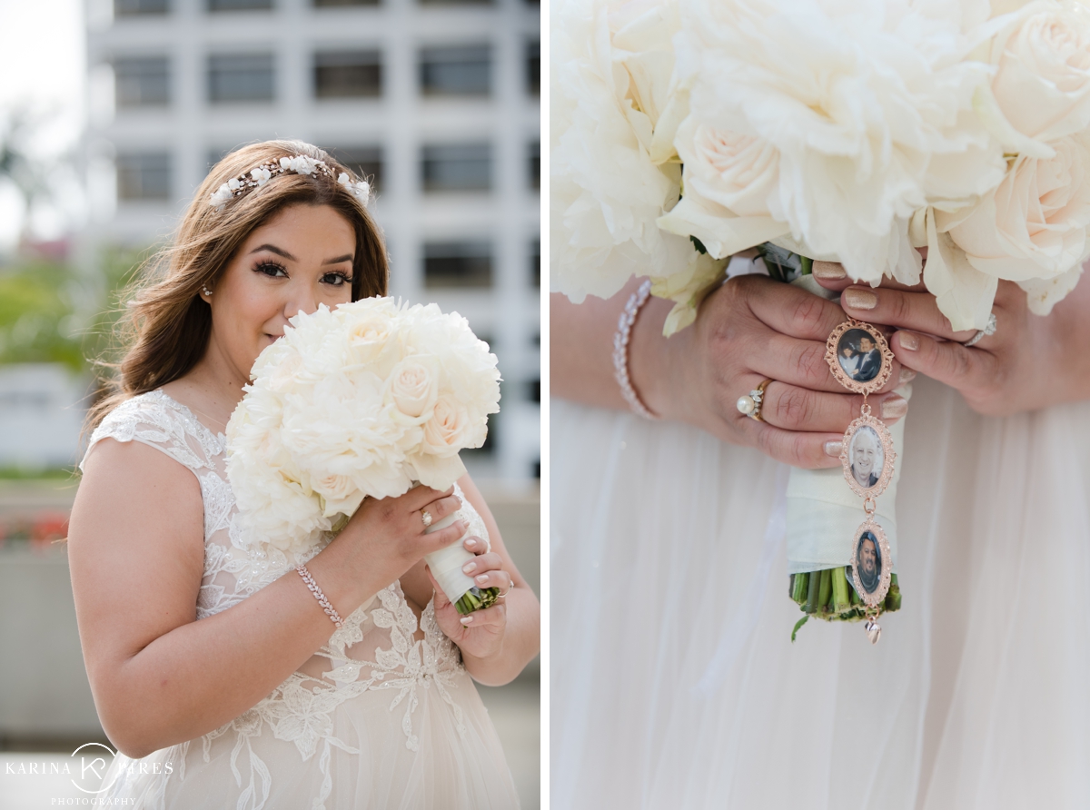 Bride holding an all white bridal bouquet with charms