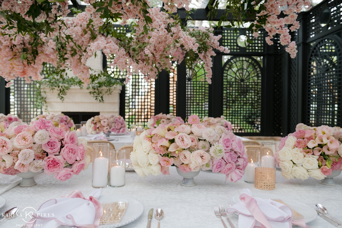Cherry blossoms hanging from the ceiling for a luxury baby shower 