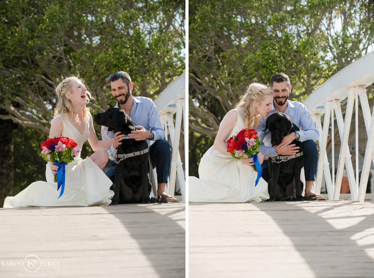 Bride and groom picture with their black lab
