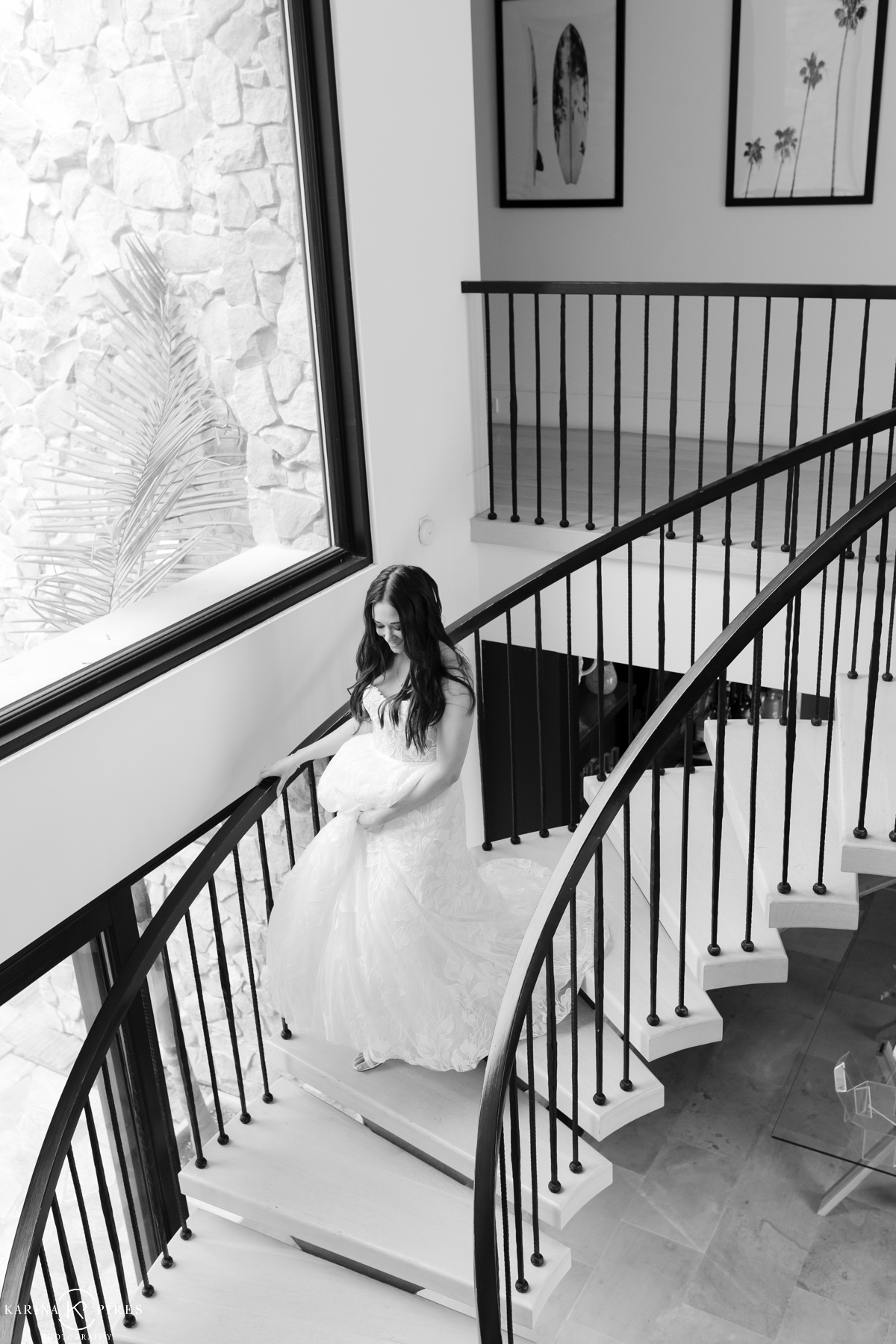 Bride walking down the stairs before her first look
