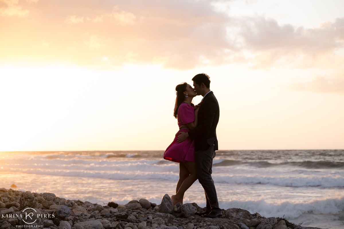 Sunset couples portraits after their proposal, on Rat Beach