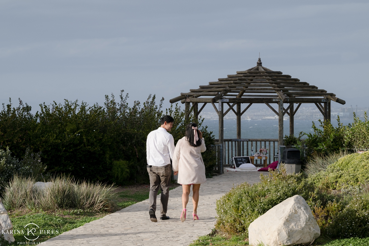 Couple walking to a gazebo at Roessler Point