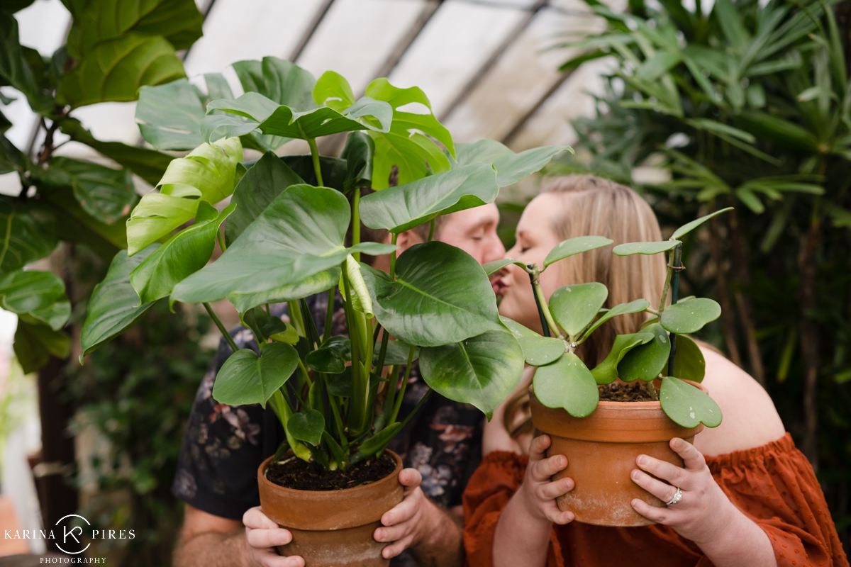 A couple at a greenhouse in Los Angeles for couples picture session 