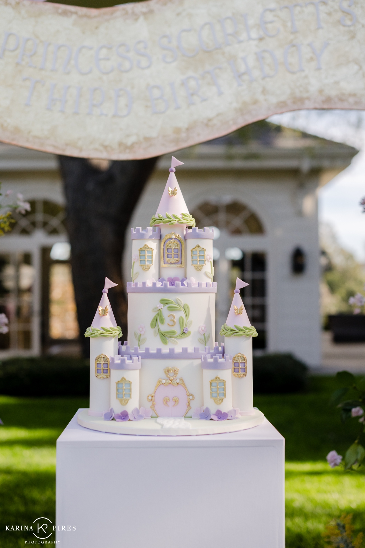 Princess-themed birthday party castle cake
