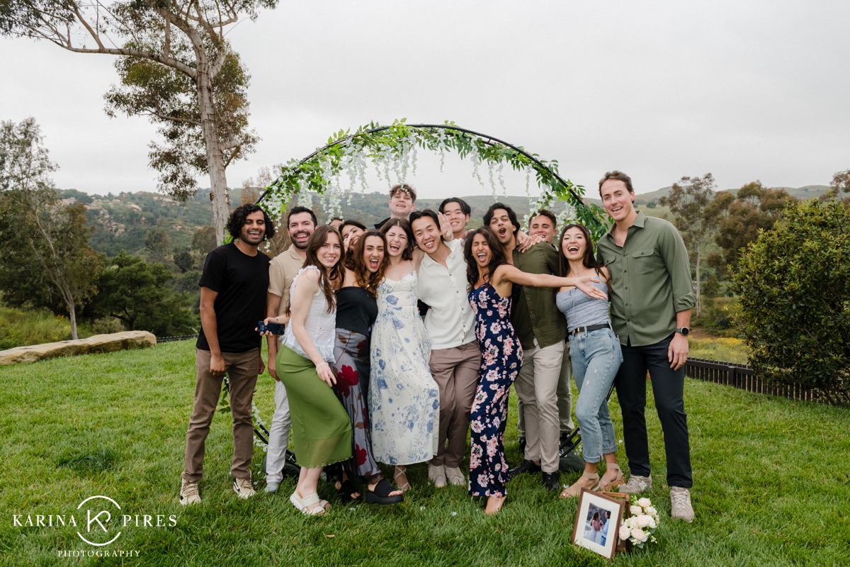 A couple celebrating with their friends after getting engaged