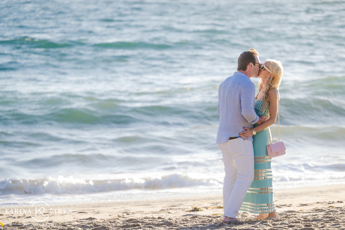 Couple kissing on the beach in Malibu, California