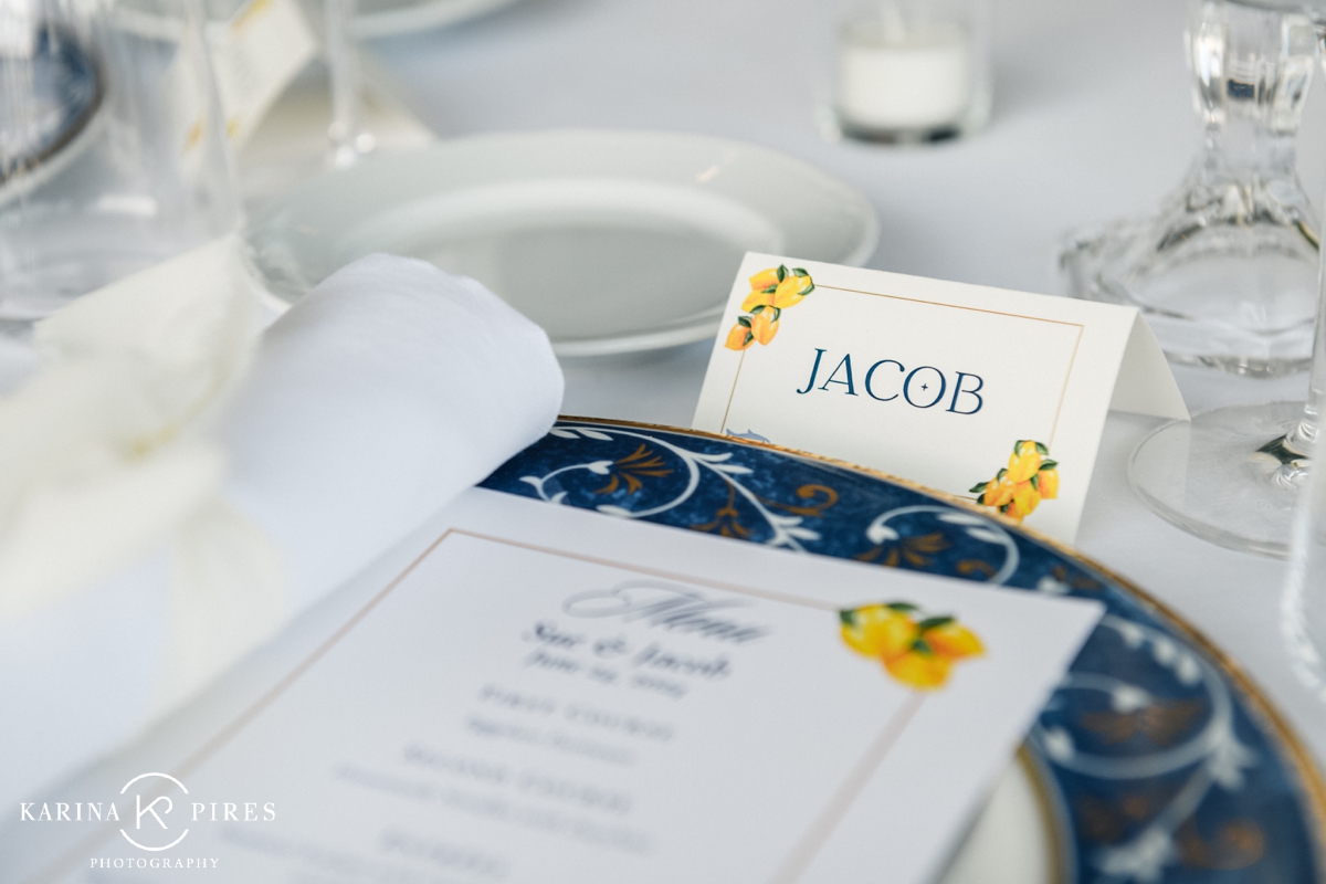 Wedding place card with blue typography and lemons