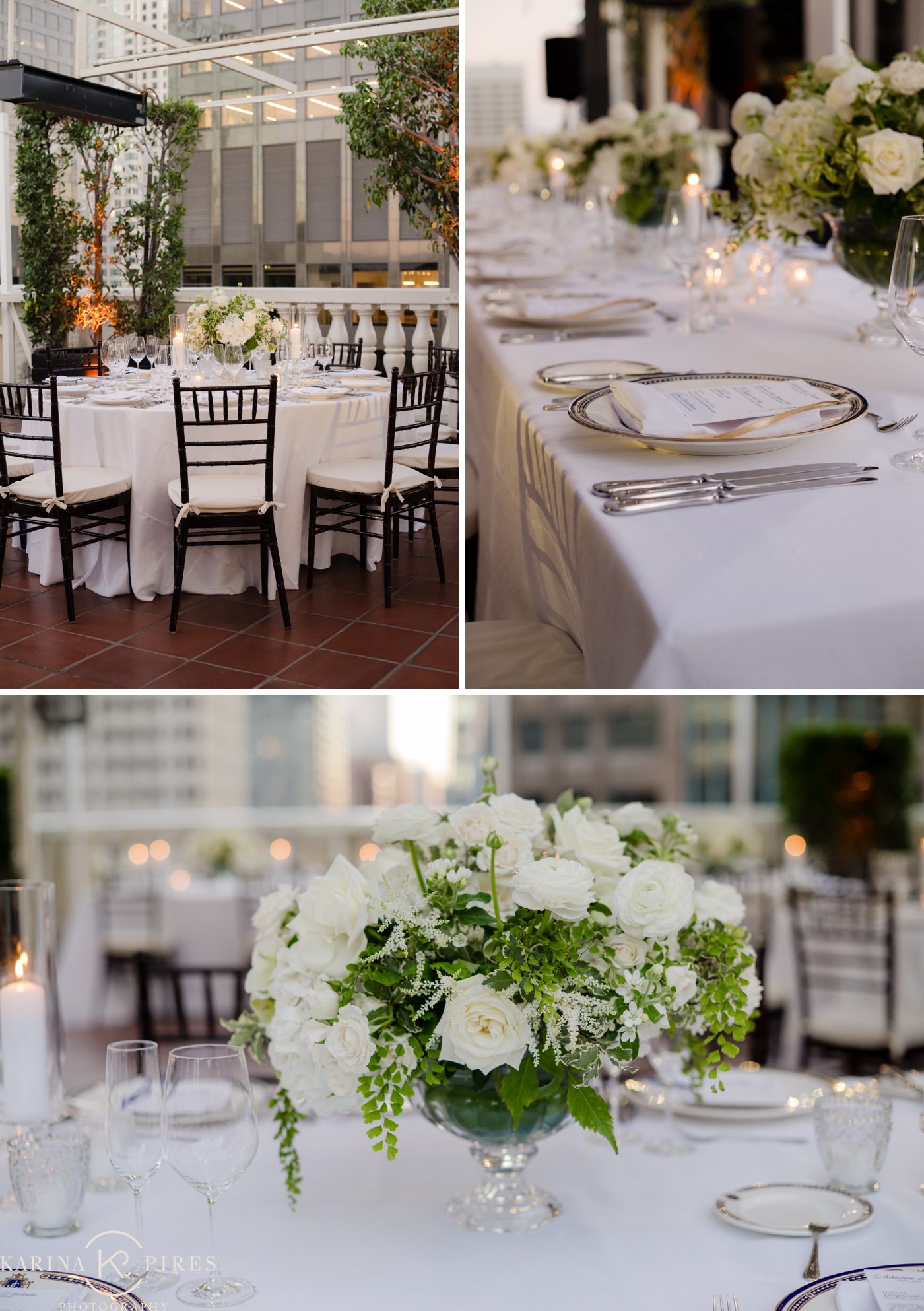A close-up detail of the reception tablescape with silver-rimmed charger plates, a folded menu card, crystal glassware, and taper candles along a white linen runner; a lush white and green centerpiece of garden roses, ranunculus, and trailing greenery in a glass compote vase, at Jonathan Club in Los Angeles