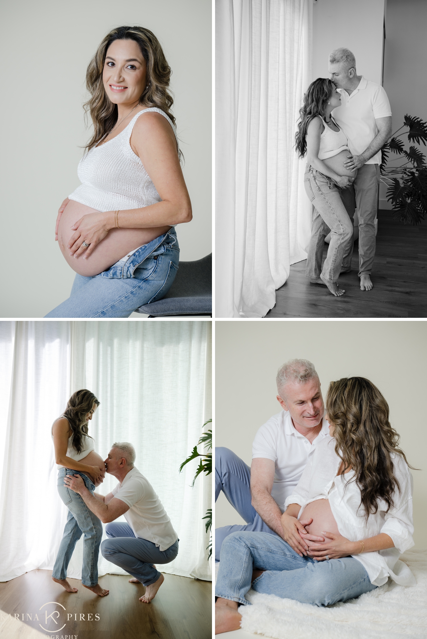 An expecting mother and her husband posing for a maternity session in their LA home, with sheer curtains behind them, both wearing light jeans and a white shirt